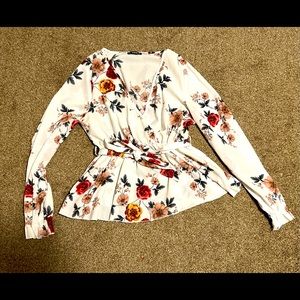 White floral blouse that ties at the waist with cute flare sleeves